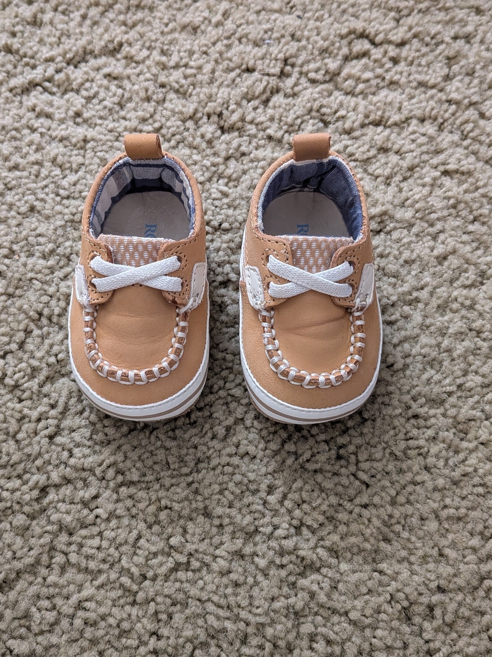 Robeez Tan and White Baby Boat Shoes with Decorative Stitching